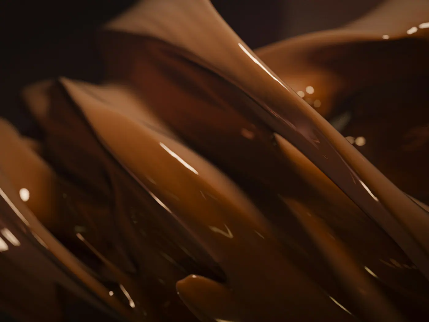 Chocolate fluido em movimento dentro de uma cuba de produção
